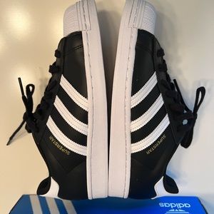RARE - Adidas Superstar sneakers. BNIB unworn! Black with white & gold details.